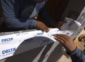 men applying the DELTA®-FLASHING