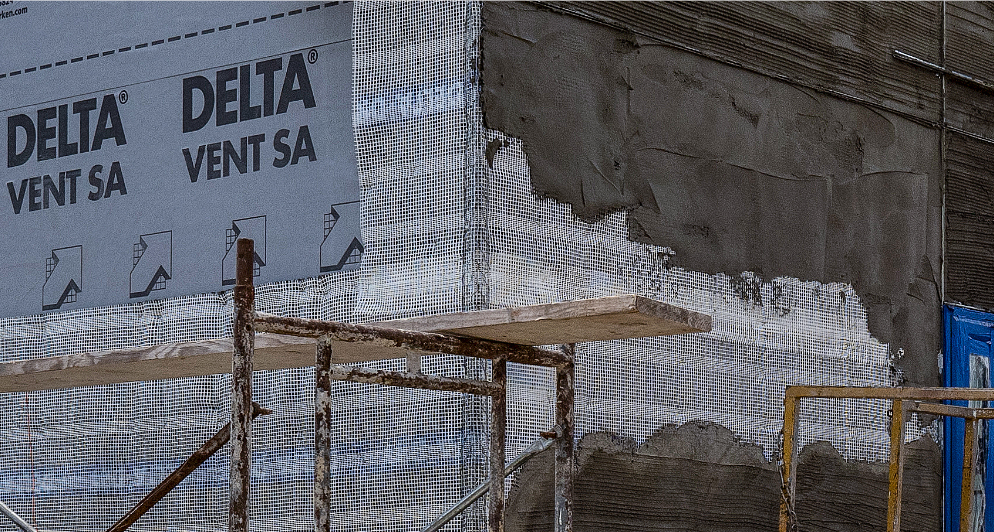 DELTA VENT-SA behind stucco