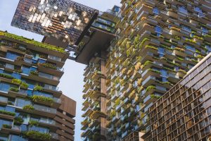 green, eco friendly mixed-use dual high-rise building with external hanging gardens